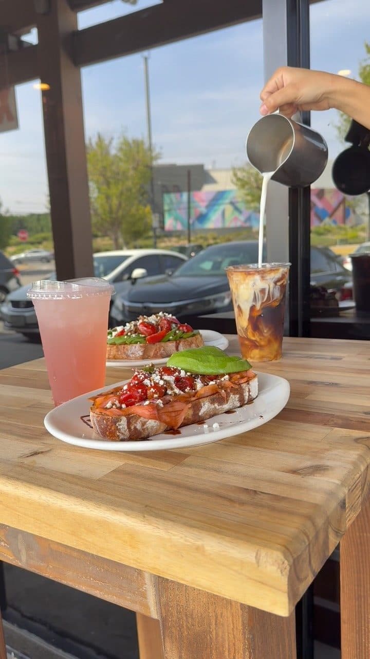 Toasts and iced drinks by the window at TOASTED